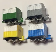 Pocket Fantasy dark green, grey, yellow and blue coaches