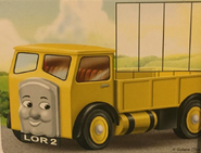 Lorry 2's promotial artwork in a board game