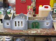 Katy making several buildings and set pieces for Great Waterton
