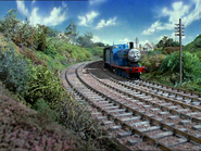 Edward passing by the bridge and signalbox in the first season