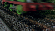 Percy's wheels skidding on the oily track