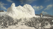 The statue covered in snow