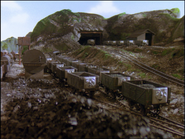 A group of trucks on the upper tracks