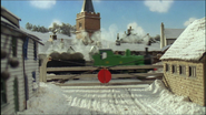 Oliver racing past the The Mountain Village level crossing