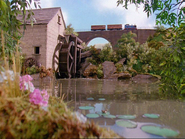 Thomas passing the Watermill with Annie and Clarabel