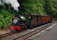 Peter Sam pulling coaches on the Talyllyn Railway