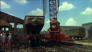 Hector being lifted back onto the tracks by Rocky