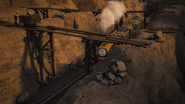 Two workmen pushing a mine trolley at the Clay Pits