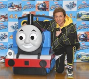 IssaHentona2.jpg (97 KB) ISSA at a press conference for Big World! Big Adventures!