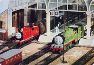Henry and James without their coal loads, showing the servo and antenna wires to their receivers inside