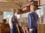 James' fireman talks to a signalman inside the signalbox