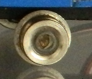 A view of the trailing wheel and nylon bushing