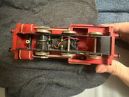 A view of the Skarloey model's undercarriage (plunger pickups are visible)