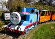 Annie and Clarabel being pulled by Thomas at Drusillas Park.