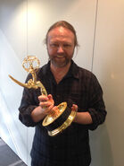 Paul Larson with an Emmy