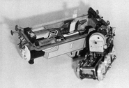 Thomas' inner workings with the servo visible on inside his boiler and his receiver with its casing removed behind it