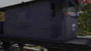 A dark purple brake van