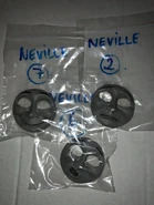 NevilleFaces.jpg (78 KB) Neville's smiling, shocked and sad faces in storage bags as previously owned by a private collector