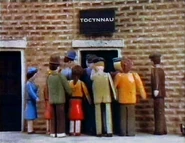 Ticket office sign is translated into Welsh