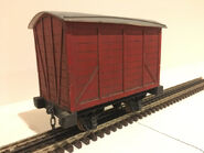 A large scale red narrow gauge van owned by Twitter and Instagram user ThomasTankMerch