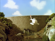 Harold flying past the fixed dam