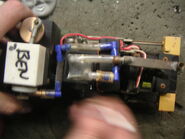 Ben with two Futaba FP-S143 servos for his eye mechanism and his receiver behind them
