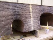 The Standard and Narrow Gauge Tunnel Runby being restored by Katy Lloyd during production