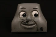 George's smiling face prior to being sold by The Prop Gallery