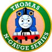 Tomix Thomas Logo (1998-2012)