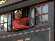 Russell Means driving the Rainbow Sun