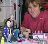 Sean Hedges-Quinn with models of Thomas, Rosie and Sir Topham Hatt