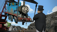 Thomas lifted out of the cavern