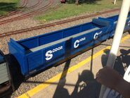 Two blue SSC trucks at The Train Shed