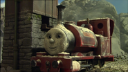 (Note: Skarloey's trailing wheels are not sitting on the rails and he is wearing Rheneas' happy face mask)