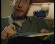 Michael Rosen playing with the Thomas Noisy Book