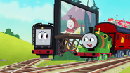 Percy and Diesel by the billboard