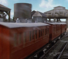 Red Coaches with white roofs