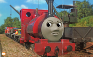 (Skarloey's trailing wheel is derailed)