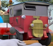 A multi-coloured lorry