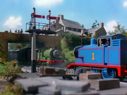 (Note: The bolt holding Thomas' coupling rods on his front wheels is missing)