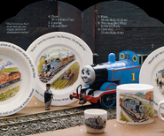 Thomas' model with the gauge 1 figurine of The Fat Controller arranged with items from the Wedgwood range
