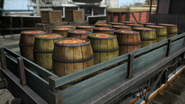 A stakebed wagon loaded with jam barrels