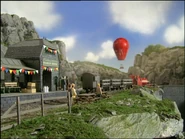 TheGrandOpening70.png (2.23 MB) The Hot Air Balloon flying past the station