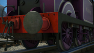 A closeup of Ryan's wheels, buffer and coupling hook