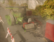 Two of the trucks after being overturned by George