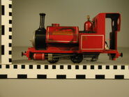 (Note: His trailing wheels are missing and his chassis is unpainted)