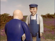 A signalman with Sir Topham Hatt