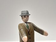 The figure's small scale head in the present day