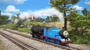 Thomas and Ruth in the park with an oil tanker