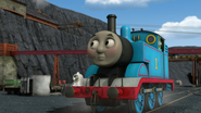 Thomas next to the derailed waste wagon
